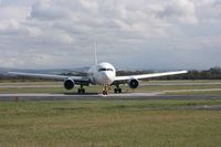 G-VKNI @ EGCC - Taken at Manchester Airport on a typical showery April day - by Steve Staunton