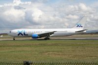 G-VKNI @ EGCC - Taken at Manchester Airport on a typical showery April day - by Steve Staunton