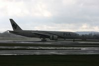 AP-BGZ @ EGCC - Taken at Manchester Airport on a typical showery April day - by Steve Staunton