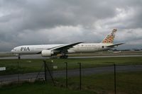 AP-BID @ EGCC - Taken at Manchester Airport on a typical showery April day - by Steve Staunton