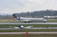 D-ACKJ @ EGCC - Taken at Manchester Airport on a typical showery April day - by Steve Staunton