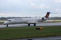 D-ACKJ @ EGCC - Taken at Manchester Airport on a typical showery April day - by Steve Staunton