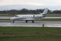 M-BWFC @ EGCC - Taken at Manchester Airport on a typical showery April day - by Steve Staunton