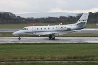 M-BWFC @ EGCC - Taken at Manchester Airport on a typical showery April day - by Steve Staunton