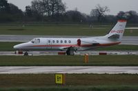 VP-CED @ EGCC - Taken at Manchester Airport on a typical showery April day - by Steve Staunton