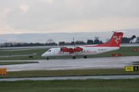 OE-HBC @ EGCC - Taken at Manchester Airport on a typical showery April day - by Steve Staunton