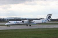G-JEDW @ EGCC - Taken at Manchester Airport on a typical showery April day - by Steve Staunton