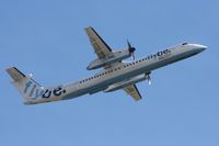 G-JEDW @ EGCC - Taken at Manchester Airport on a typical showery April day - by Steve Staunton