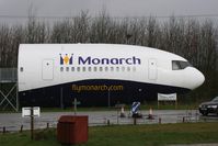 G-DMCA @ EGCC - Taken at Manchester Airport on a typical showery April day - by Steve Staunton