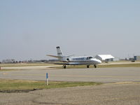 N399QS @ KFCM - Taxiing to Runway 10R before departing IFR to Fayetteville, AR (FYV) as EJA399. - by Mitch Sando