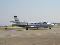 N399QS @ KFCM - Taxiing to Runway 10R before departing IFR to Fayetteville, AR (FYV) as EJA399. - by Mitch Sando