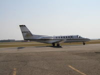 N399QS @ KFCM - Taxiing to Runway 10R before departing IFR to Fayetteville, AR (FYV) as EJA399. - by Mitch Sando