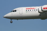 HB-IYZ @ EBBR - new sticker on swiss ARJ-100  -  flight LX778 - by Daniel Vanderauwera