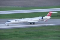 N922XJ @ CID - Taxiing to the gate on Alpha after sunset