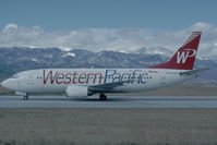N960WP @ KCOS - Western Pacific Boeing 737-300 - by Yakfreak - VAP