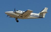 N9488C @ EDU - Cessna T303 departing EDU - by Reed Maxson