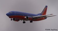 N614SW @ ORF - Southwest making an appearance under the clouds - by Paul Perry