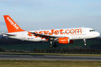 G-EZAZ @ EGGD - Easyjet A319-111. This shot shows how steep the runway is at the western end. Pilots have to approach correctly to avoid a 'tailstrike'. - by John Morris