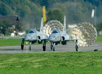 J-3076 @ LSMM - These Tigers are rolling after landing. The chutes are to be dropped any moment.