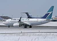 C-FWSO @ CYOW - Westjet 737 taking off Rwy 25 - by CdnAvSpotter