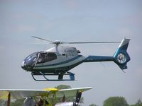 G-DRLH @ EGBK - EC120 landing at Sywell, note Tiger Moth G-ALIW in foreground - by Simon Palmer