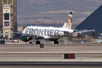 N920FR @ KLAS - Frontier Airlines - 'Carl the Coyote' / 2003 Airbus A319-111 - by Brad Campbell