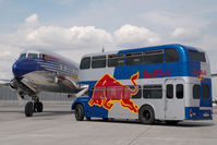 N996DM @ VIE - Red Bull DC6 - by Yakfreak - VAP