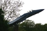 75-0039 @ FFO - F-15A mounted at Wright-Patterson AFB gate.  No photos allowed up close, so this was shot on the road through the trees. - by Glenn E. Chatfield