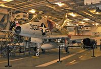 142833 - Seen aboard the USS Intrepid, this Skyhawk was on loan from the National Museum of Navial Aviation. - by Daniel L. Berek