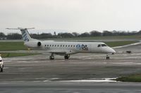 G-ERJF @ EGCC - Taken at Manchester Airport on a typical showery April day - by Steve Staunton