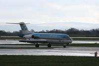 PH-KZM @ EGCC - Taken at Manchester Airport on a typical showery April day - by Steve Staunton
