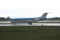 PH-KZM @ EGCC - Taken at Manchester Airport on a typical showery April day - by Steve Staunton