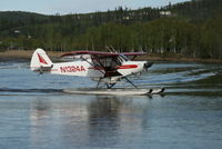 N1324A - Landing on the Chena River Fairbanks AK - by Ekkehard Kuner