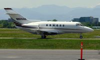 N855QS @ KAPA - Taxiing after landing rwy 17L - by Victor Agababov