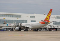 B-6089 @ EBBR - Hainan Airlines A330 taken from the transfer bus at Brussels - by Steve Hambleton