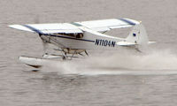 N1104N @ LHD - Piper Pa18 prepares to take off from Lake Hood - by Terry Fletcher