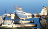 N5020E @ LHD - Cessna 180A moored on Lake Hood - by Terry Fletcher