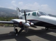 N402DR @ SZP - 1967 Cessna 402, two Continental TSIO-520-VBs 325 Hp each, ex C-FFAP, security chain on prop - by Doug Robertson