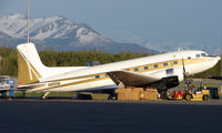 N851M @ ANC - DC3 sits in late evening sun at Anchorage Int - by Terry Fletcher