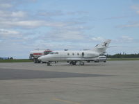 N76AM @ CYYR - Parked at Woodwards FBO  Goose Airport NL - by Frank Bailey