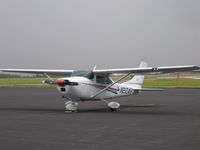 N2104R @ KGSO - very friendly folks arrived in this 182 to wait out storms - by Tom Cooke