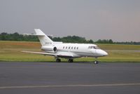 N791TA @ KGSO - Hawker 800XP on the back row - by Tom Cooke