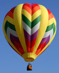 N20441 @ N51 - A colorful balloon sets off on a bright adventure on a sunny summer evening. - by Daniel L. Berek