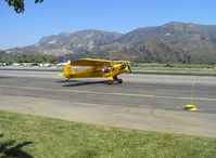 N98425 @ SZP - 1946 Piper J3C-65 CUB, Continental C90 upgrade, taxi to hangar - by Doug Robertson