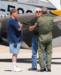 N51JT @ KBJC - Photo Credit Bluedharma. Photographer John L, P-51D Crusader Owner-Pilot Joe Thibodeau, and P-51D Crazy Horse Pilot/Owner Lee Lauderbach at Jeffco. It was real honor to work for these two gentleman during the Metro Open House. - by John Little