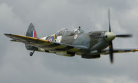 G-BMSB @ EGNW - !943 Spitfire doing fly past at Wickenby Wings and Wheels 2008 - by Terry Fletcher