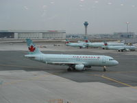 C-GPWG @ CYYZ - Air Canada Airbus A320 taxi to gate - by Ken Wang