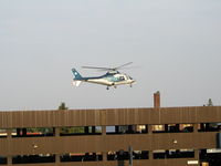 N40NM @ MN48 - Air Care 5 landing on the parking ramp near the main helipad at St. Luke's in Duluth. - by Mitch Sando