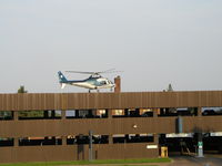 N40NM @ MN48 - Air Care 5 landing on the parking ramp near the main helipad at St. Luke's in Duluth. - by Mitch Sando
