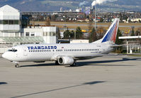 EI-DNM @ LOWS - Transaero - by Christian Waser